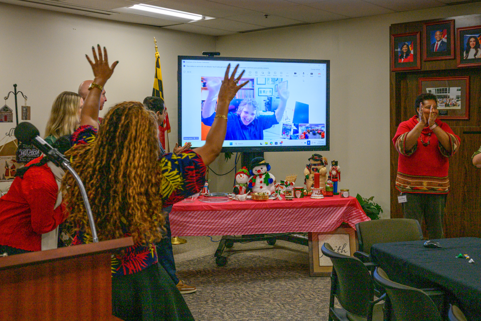  Lorian Lipton, an employee at the Maryland Department of Transportation, celebrated with her colleagues at the headquarters after winning the Employee of the Quarter award for the last quarter of 2025. Lorian joined the celebration via Microsoft Teams.