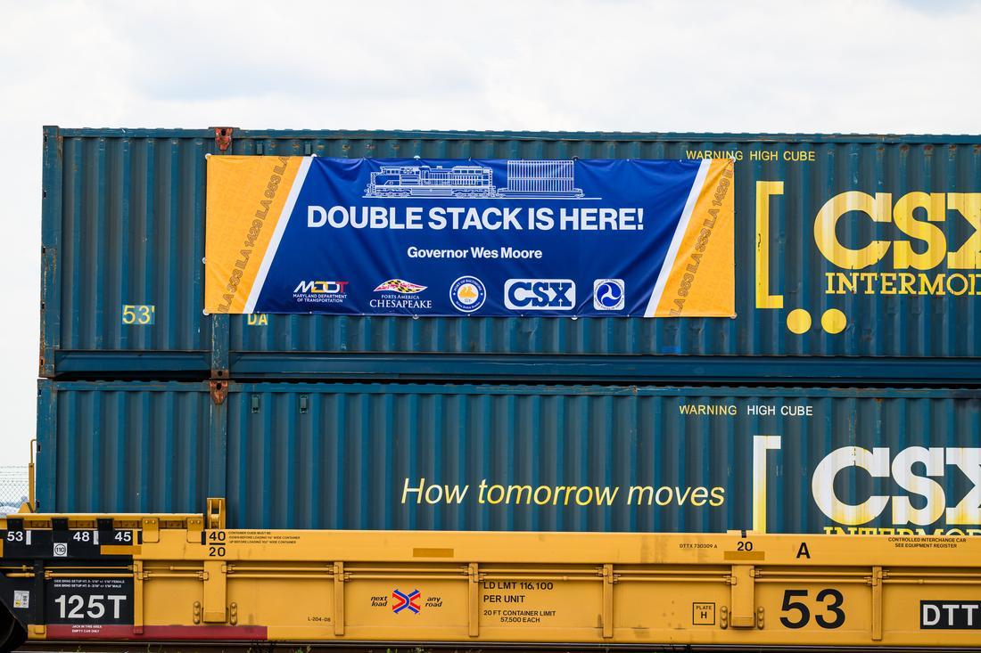 Double stacked containers on a railcar