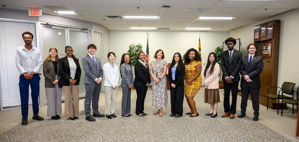 12 MDOT fellows with Transportation Secretary Katie Thomson 