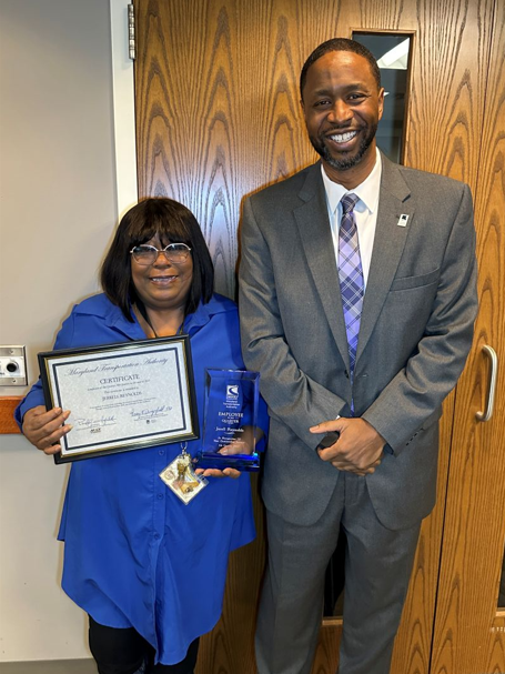 MDTA Employee of the Quarter Jerrell Reynolds celebrated the recognition of her hard work with Dr. Dangerfield.
